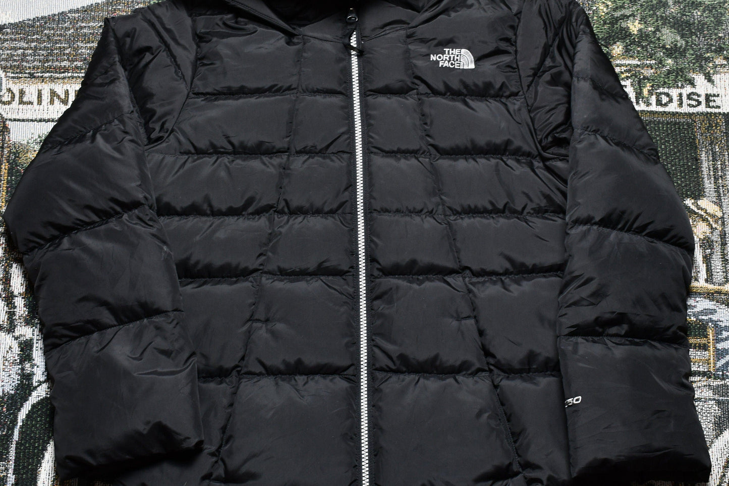 Vintage 1990s The North Face 550 Down Fill Puffer Jacket Youth Large from propervintagecanada