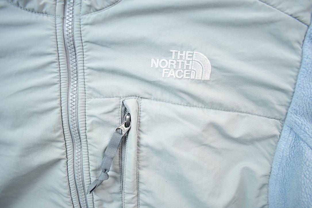 Vintage 1990s The North Face Baby Blue Fleece Sweater Women's Small from propervintagecanada