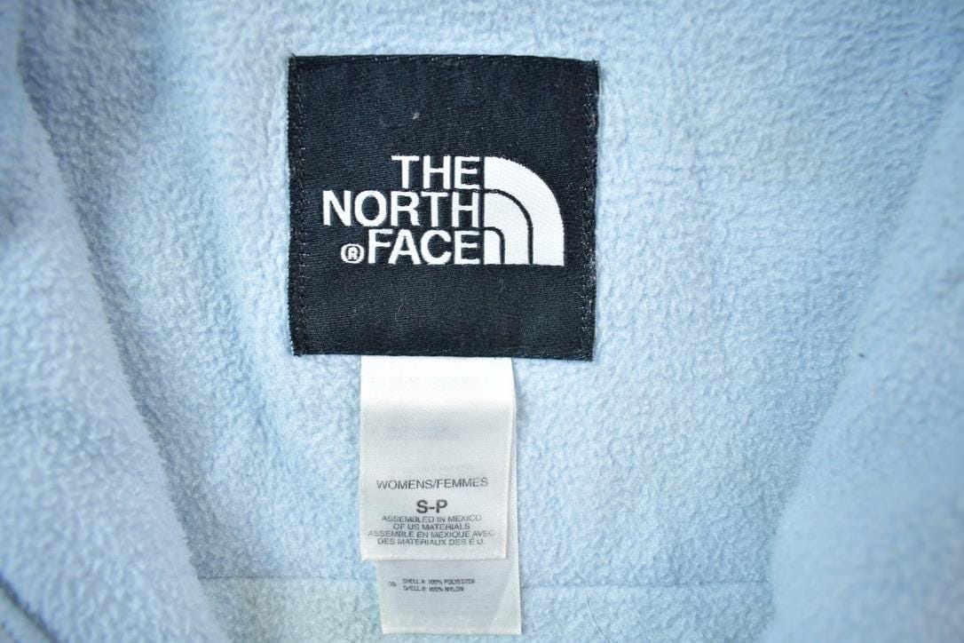 Vintage 1990s The North Face Baby Blue Fleece Sweater Women's Small from propervintagecanada