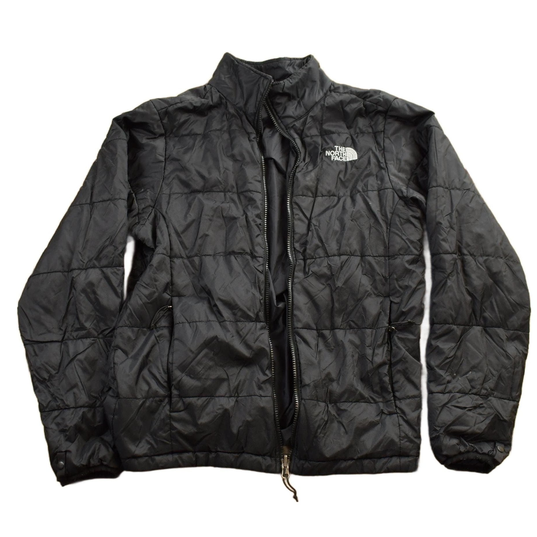 Vintage 1990s The North Face Small Black Puffer Jacket Men's S from propervintagecanada