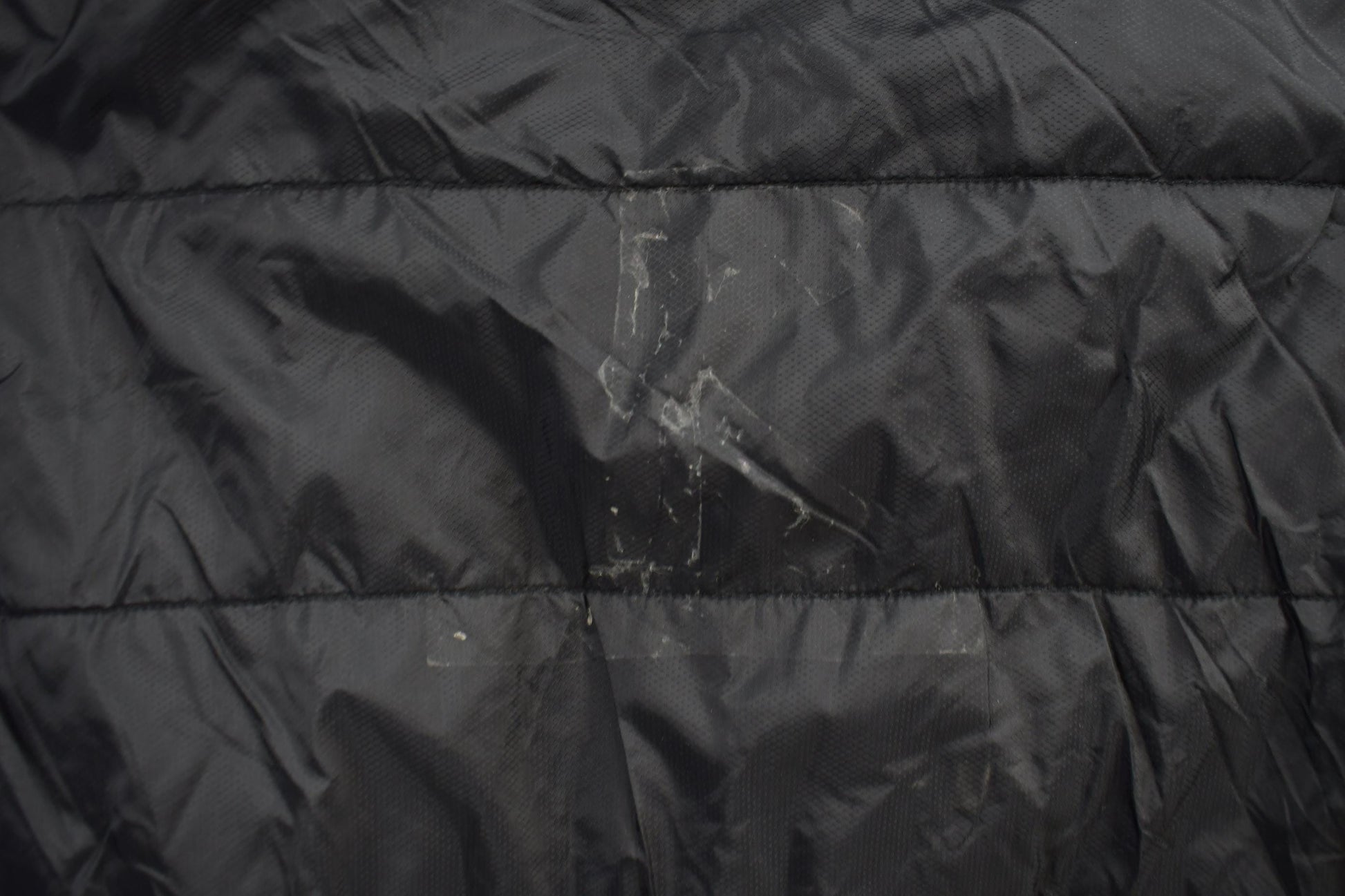 Vintage 1990s The North Face Small Black Puffer Jacket Men's S from propervintagecanada