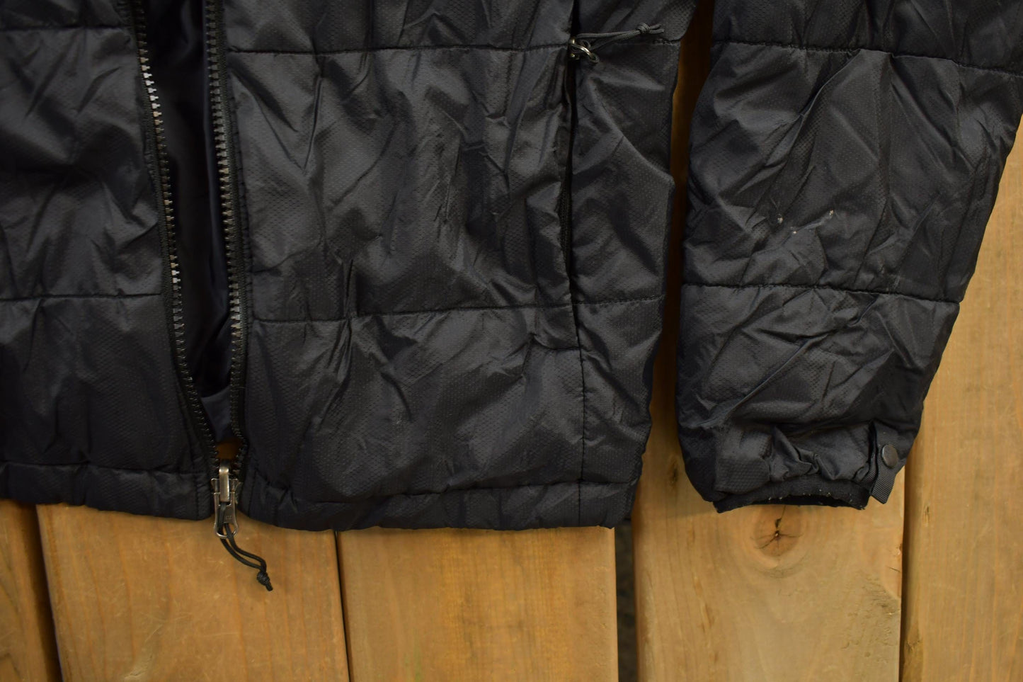 Vintage 1990s The North Face Small Black Puffer Jacket Men's S from propervintagecanada