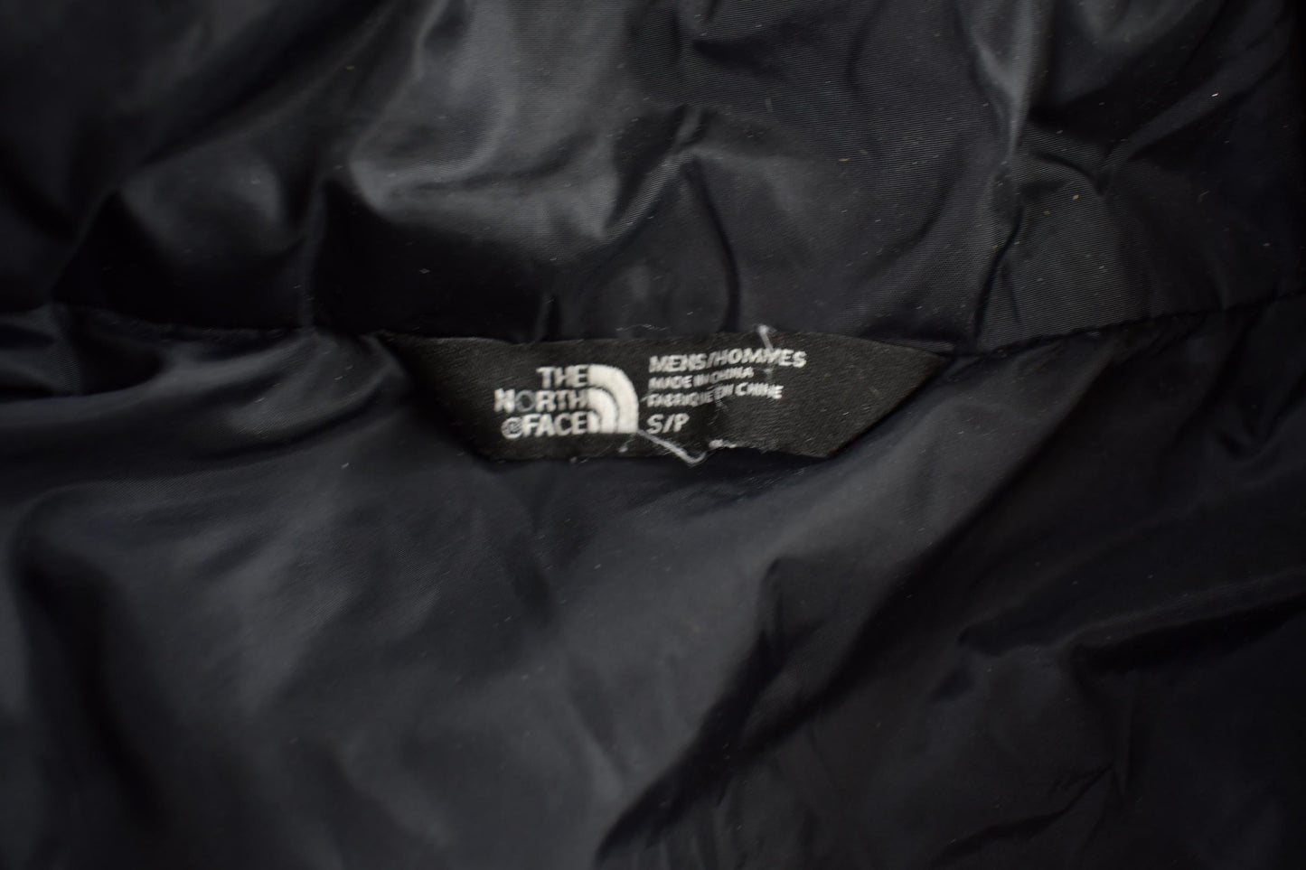Vintage 1990s The North Face Small Black Puffer Jacket Men's S from propervintagecanada