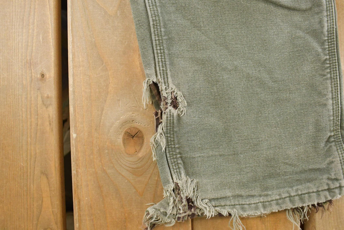 Vintage 1990s Thrashed Carhartt Carpenter Pants Men's 33 x 35.5 from propervintagecanada