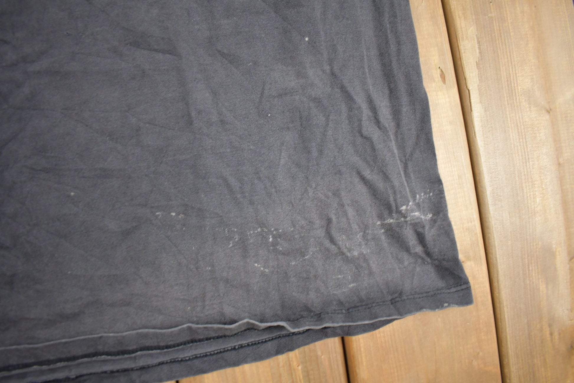 Vintage 1990s Timberland Long Sleeve Graphic T Shirt Men's XL from propervintagecanada