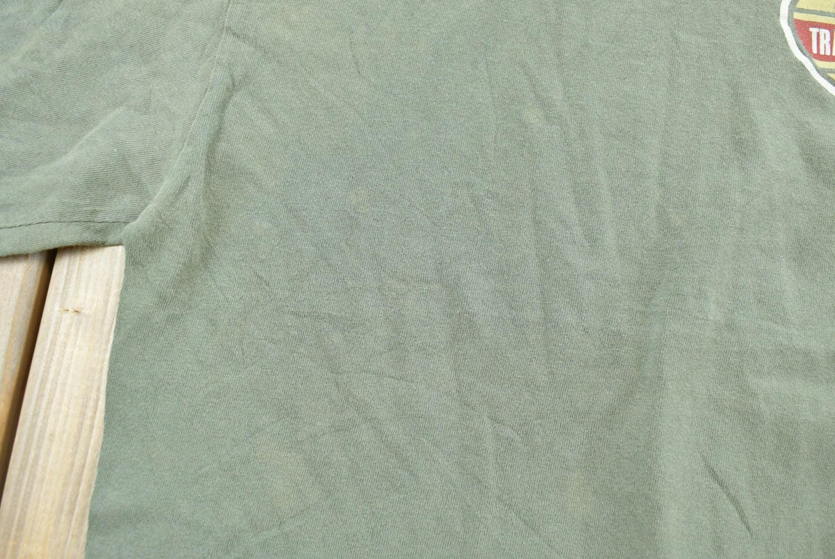 Vintage 1990s Timberland Long Sleeve Graphic T-Shirt Men's XL from propervintagecanada