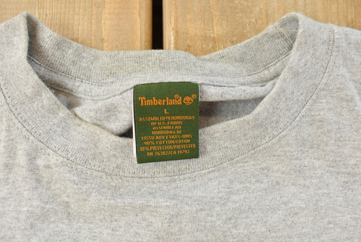 Vintage 1990s Timberland Long Sleeve Graphic T-Shirt Mens L from propervintagecanada