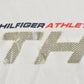 Vintage 1990s Tommy Hilfiger Athletics Graphic T-Shirt Men's XL from propervintagecanada