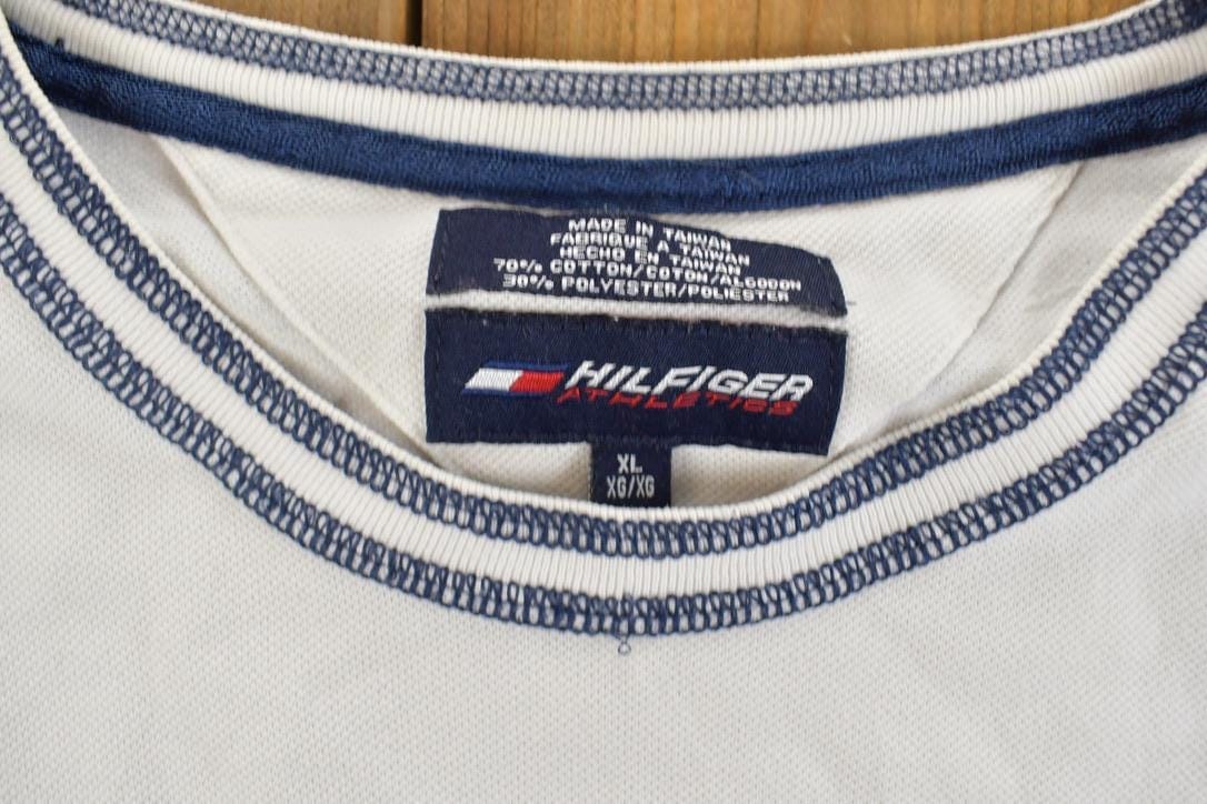 Vintage 1990s Tommy Hilfiger Athletics Graphic T-Shirt Men's XL from propervintagecanada