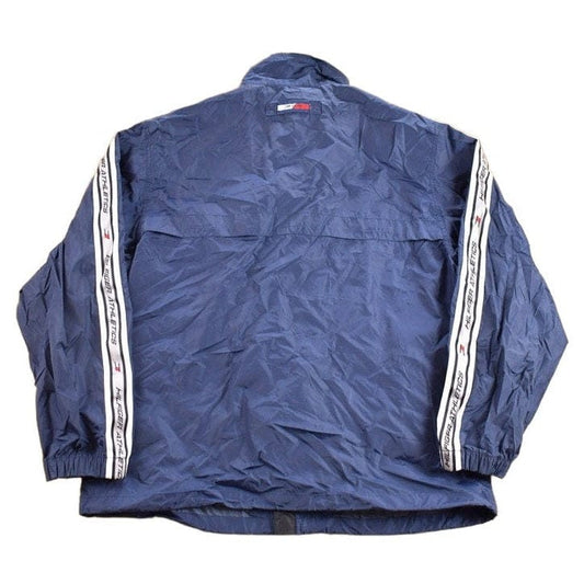 Vintage 1990s Tommy Hilfiger Athletics Windbreaker Men's Large from propervintagecanada