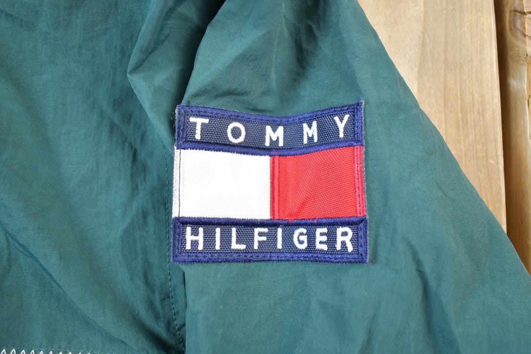 Vintage 1990s Tommy Hilfiger Big Flag Full Zip Windbreaker Jacket Men's Large from propervintagecanada