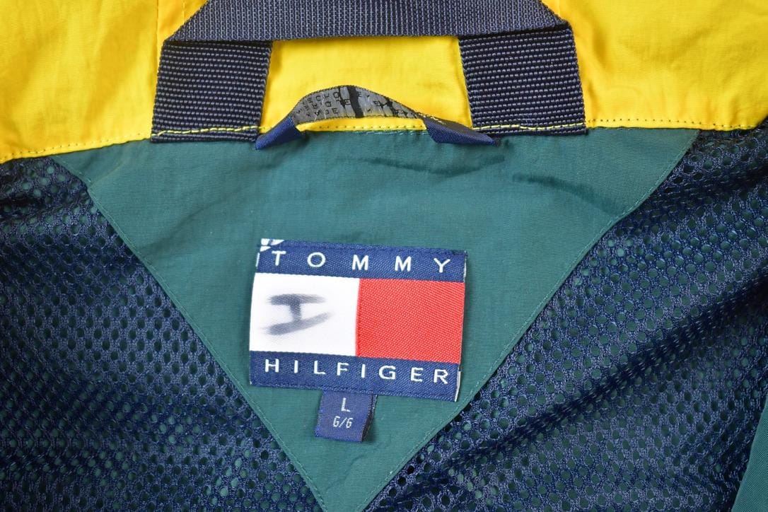 Vintage 1990s Tommy Hilfiger Big Flag Full Zip Windbreaker Jacket Men's Large from propervintagecanada