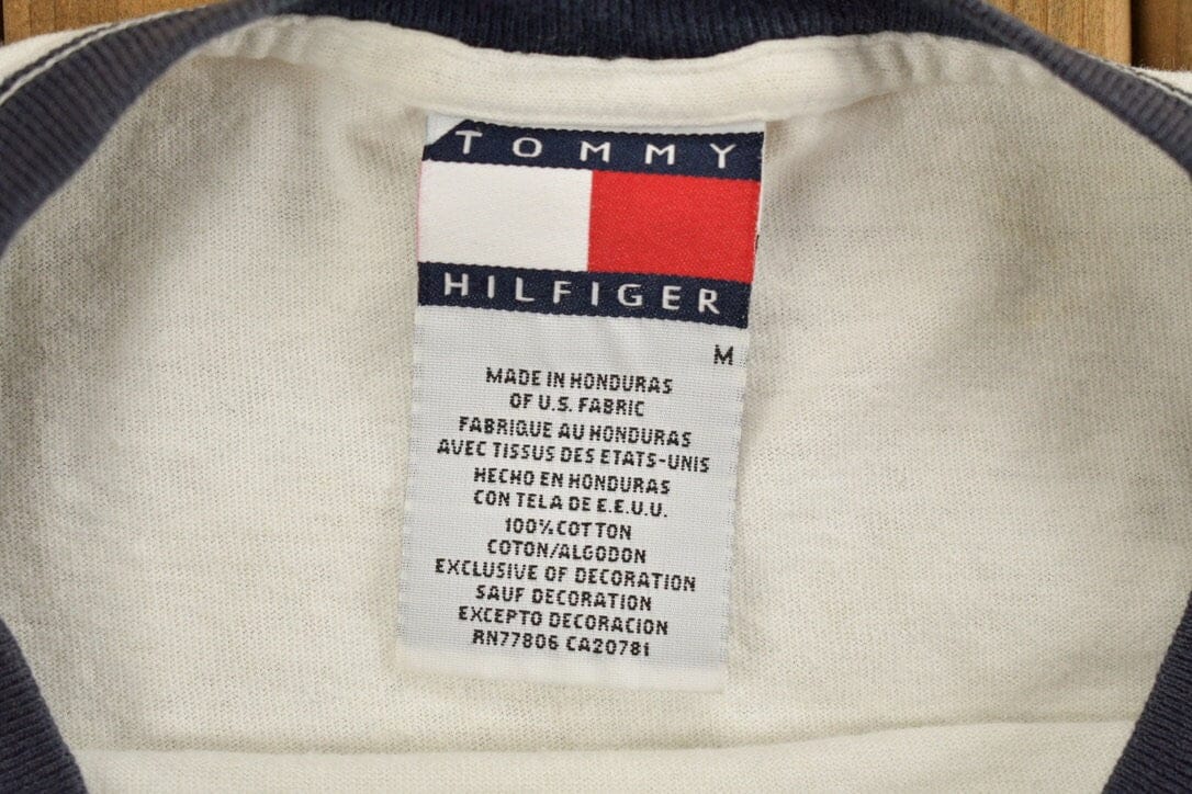 Vintage 1990s Tommy Hilfiger Big Flag Graphic T Shirt Men's Medium from propervintagecanada