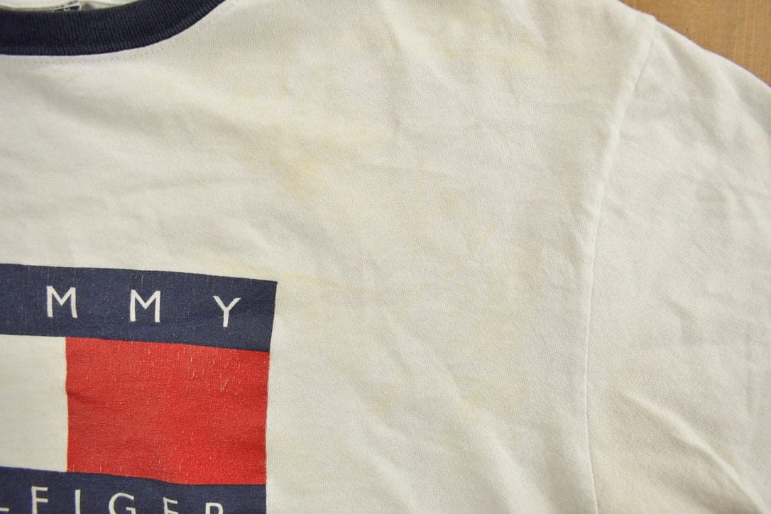 Vintage 1990s Tommy Hilfiger Big Flag Graphic T Shirt Men's Medium from propervintagecanada