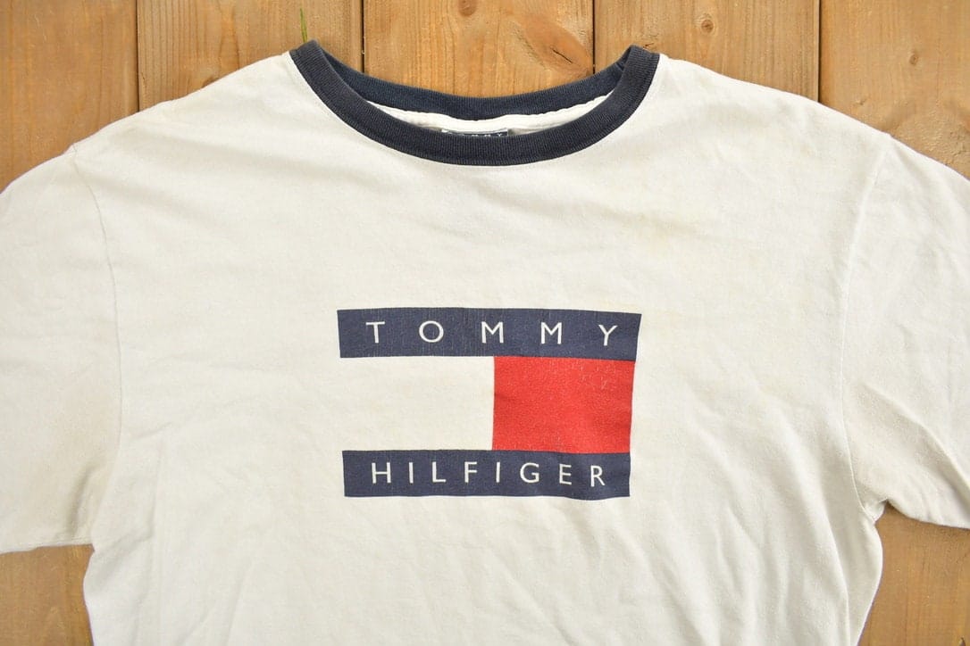 Vintage 1990s Tommy Hilfiger Big Flag Graphic T Shirt Men's Medium from propervintagecanada