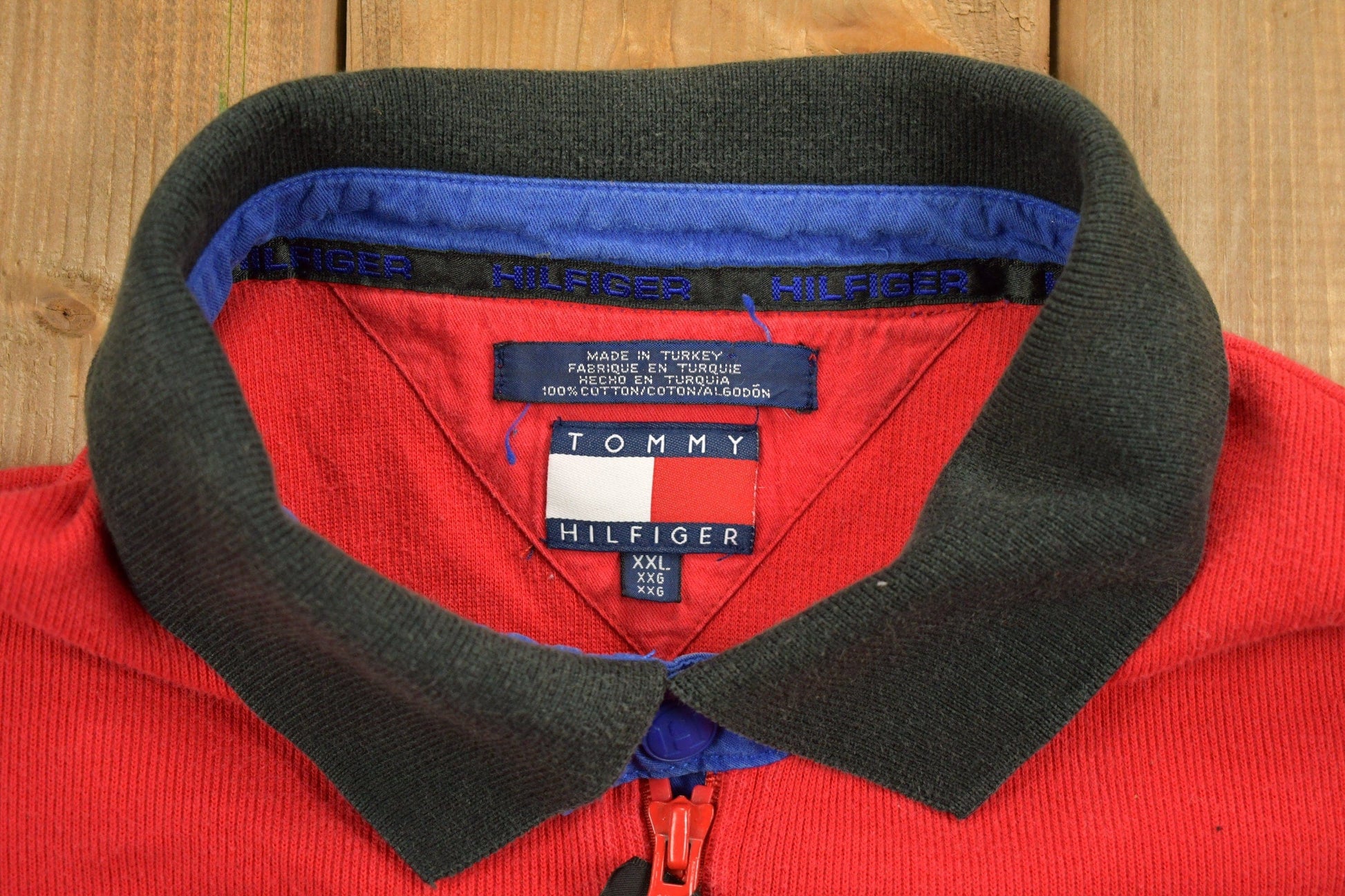 Vintage 1990s Tommy Hilfiger Collared Embroidered Quarter Zip Fleece Sweater Men's 2XL from propervintagecanada