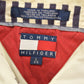 Vintage 1990s Tommy Hilfiger Crest Logo Polo Shirt Men's Large from propervintagecanada