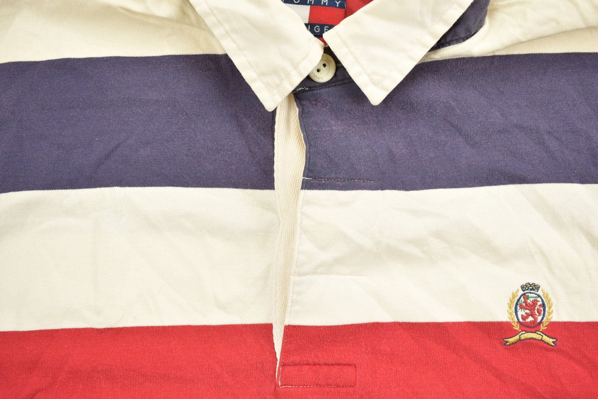 Vintage 1990s Tommy Hilfiger Crest Logo Polo Shirt Men's Large from propervintagecanada