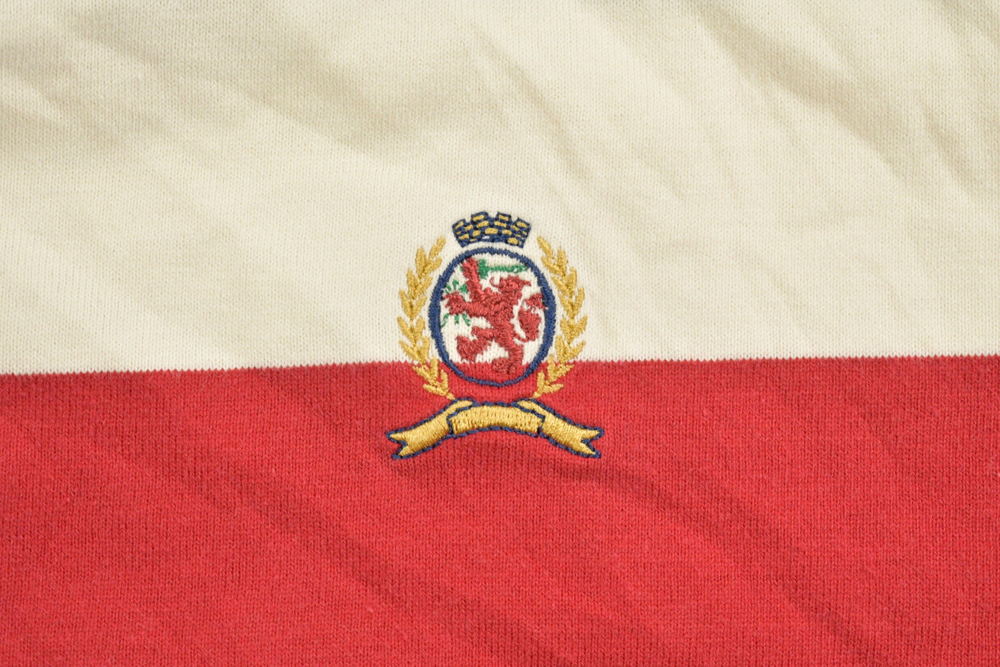 Vintage 1990s Tommy Hilfiger Crest Logo Polo Shirt Men's Large from propervintagecanada