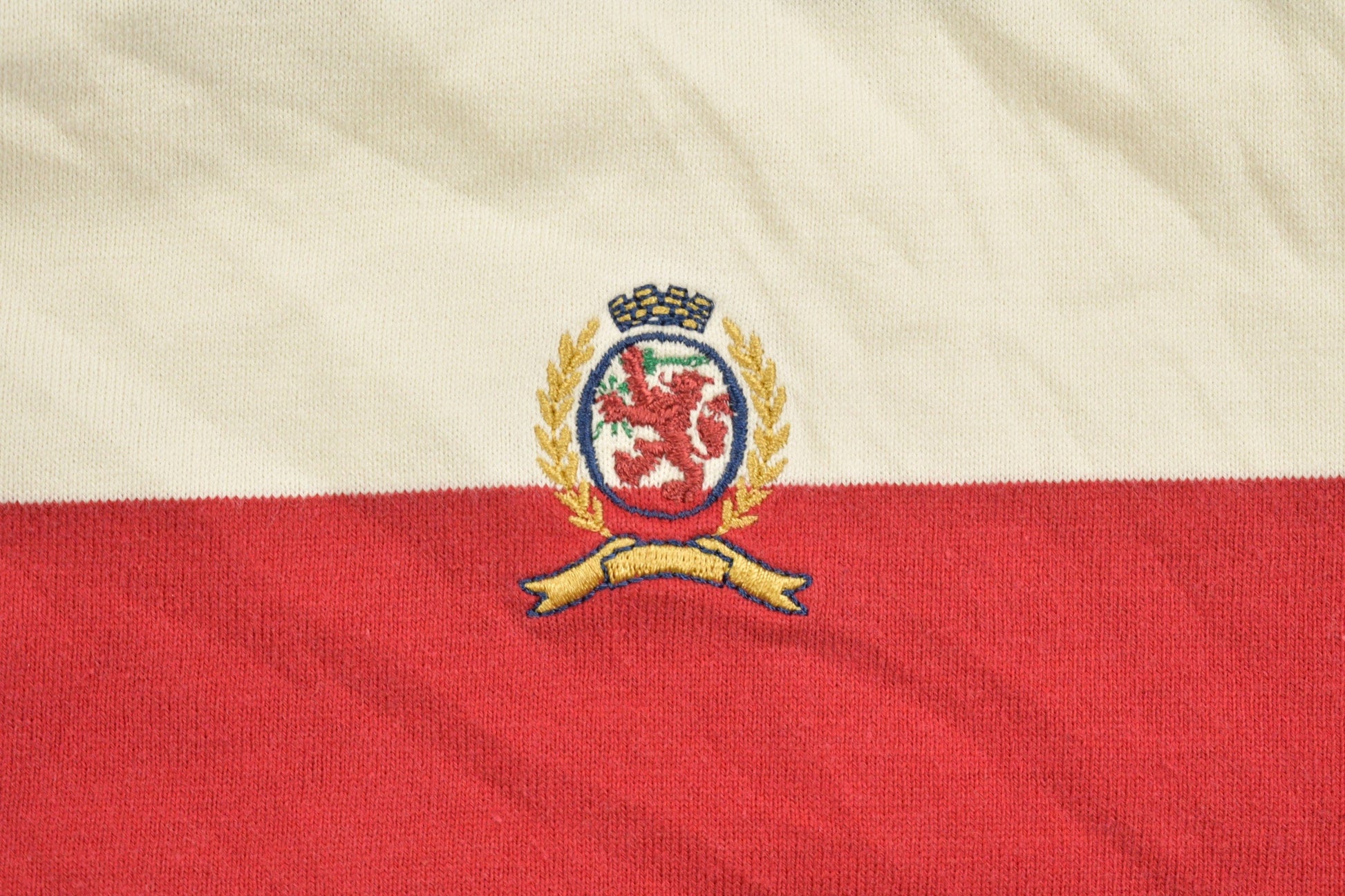 Vintage 1990s Tommy Hilfiger Crest Logo Polo Shirt Men's Large from propervintagecanada