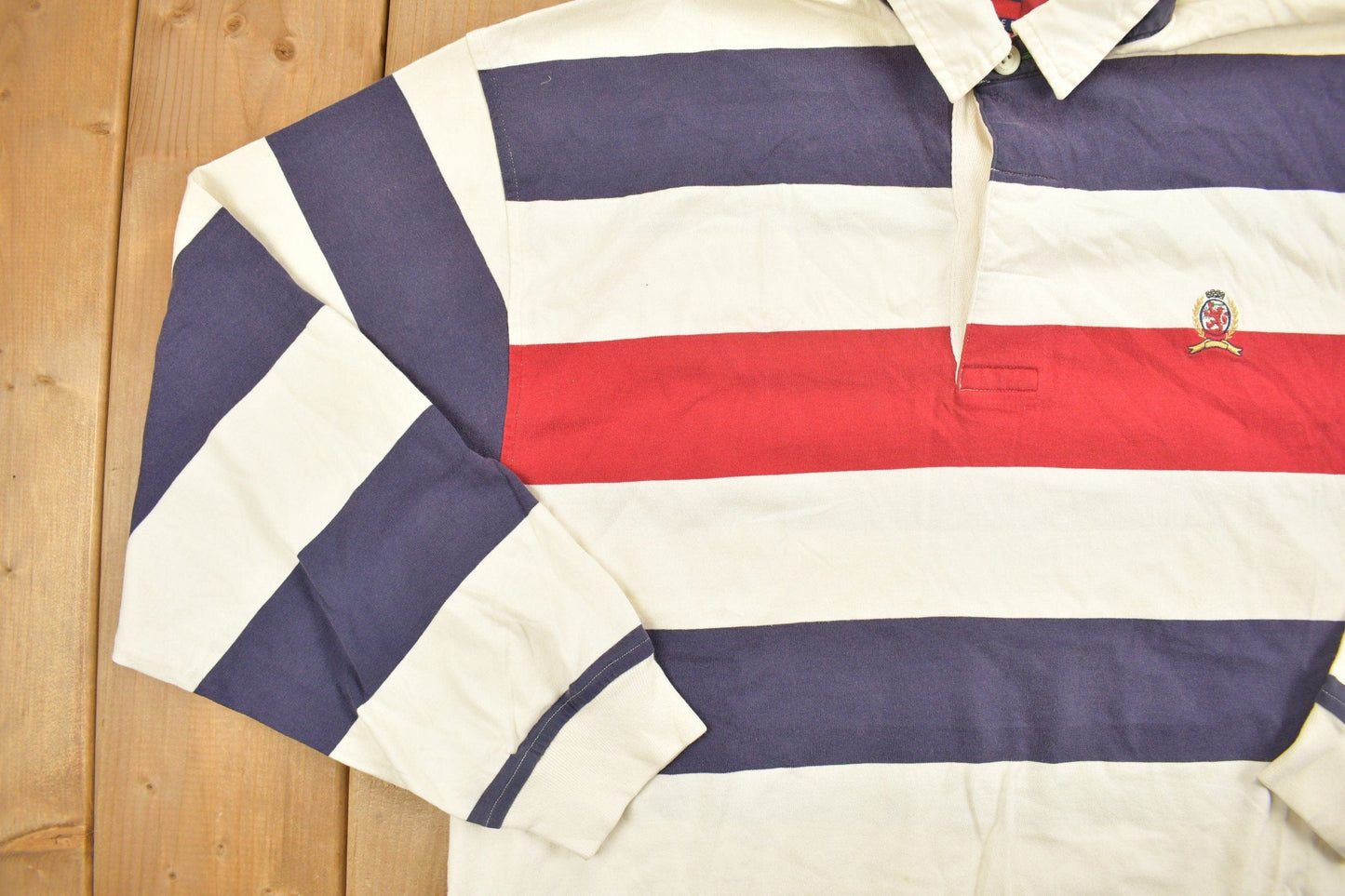 Vintage 1990s Tommy Hilfiger Crest Logo Polo Shirt Men's Large from propervintagecanada