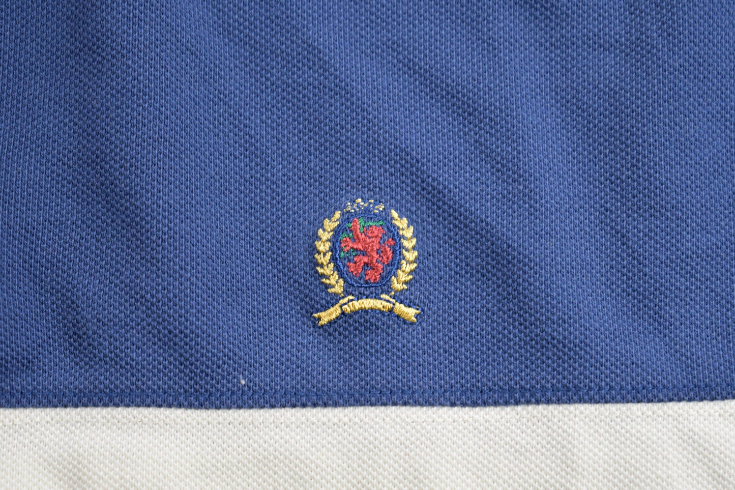 Vintage 1990s Tommy Hilfiger Crest Logo Polo Shirt Men's XL from propervintagecanada