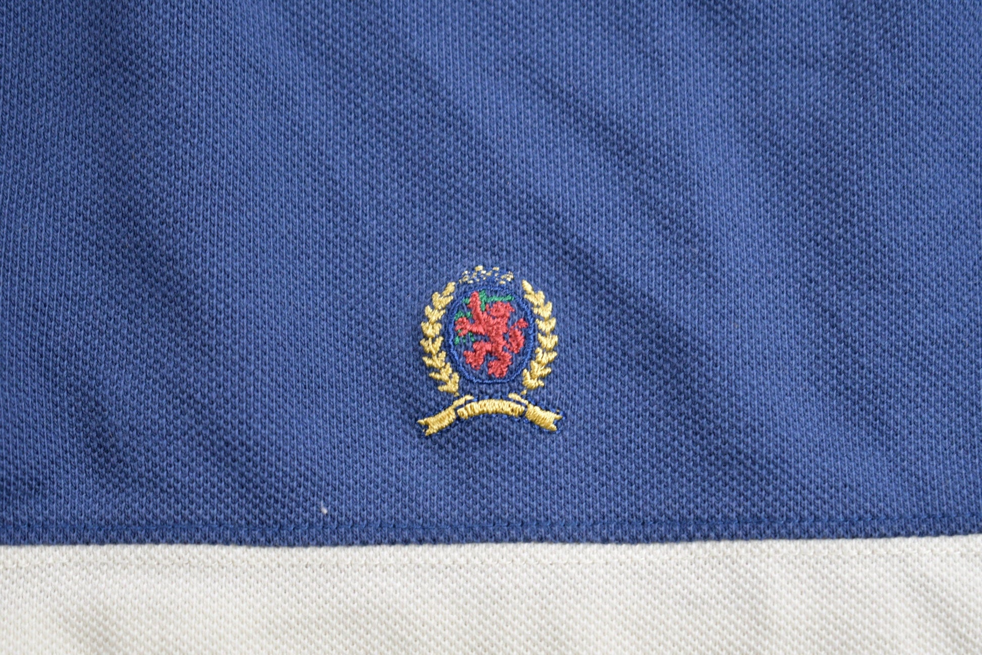 Vintage 1990s Tommy Hilfiger Crest Logo Polo Shirt Men's XL from propervintagecanada
