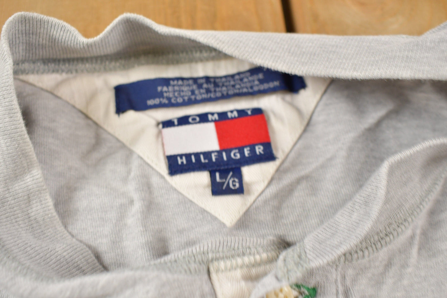 Vintage 1990s Tommy Hilfiger Embroidered Henley T-Shirt Men's Large from propervintagecanada