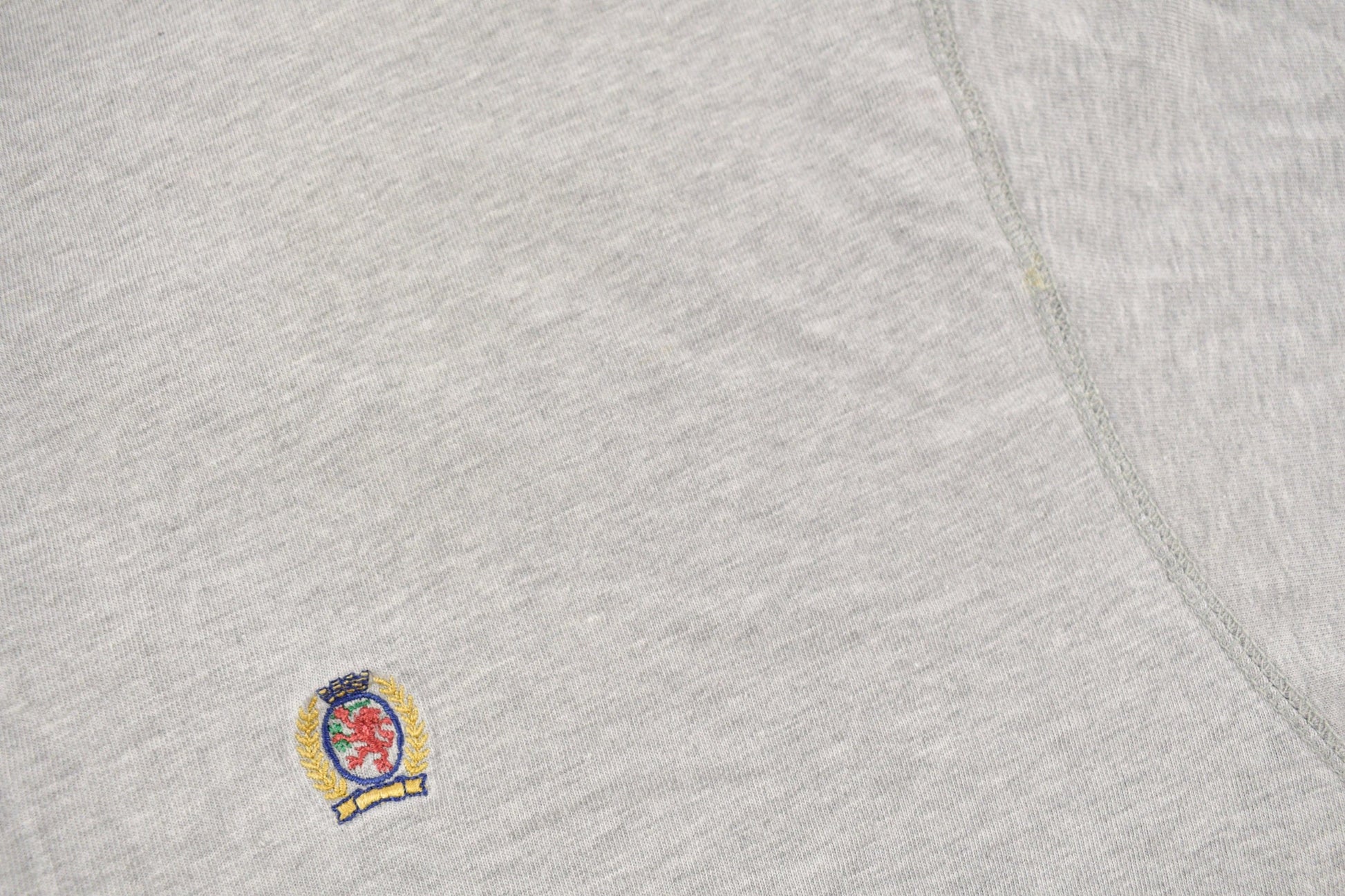 Vintage 1990s Tommy Hilfiger Embroidered Henley T-Shirt Men's Large from propervintagecanada