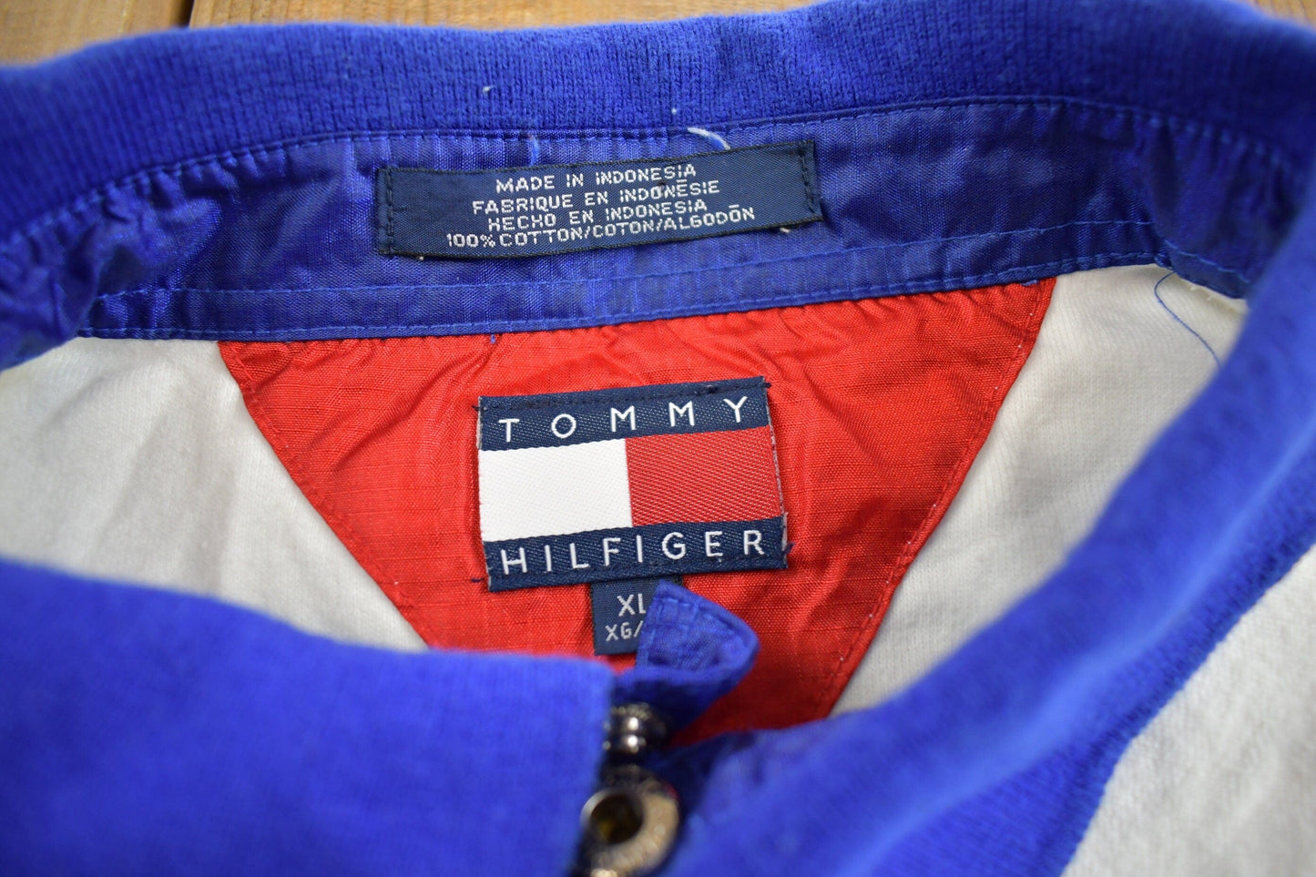Vintage 1990s Tommy Hilfiger Embroidered Zip Up T-Shirt Men's XL from propervintagecanada