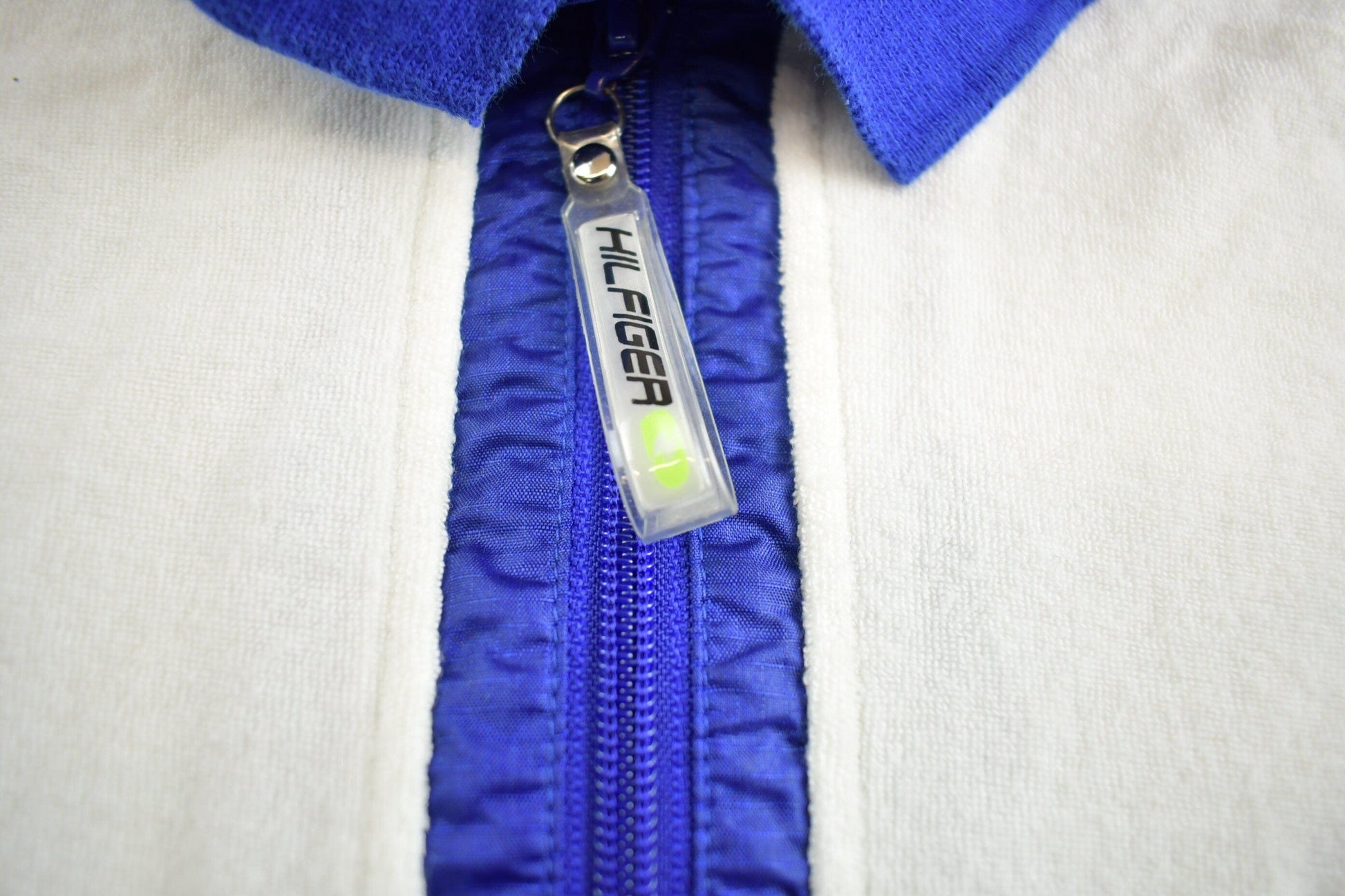 Vintage 1990s Tommy Hilfiger Embroidered Zip Up T-Shirt Men's XL from propervintagecanada