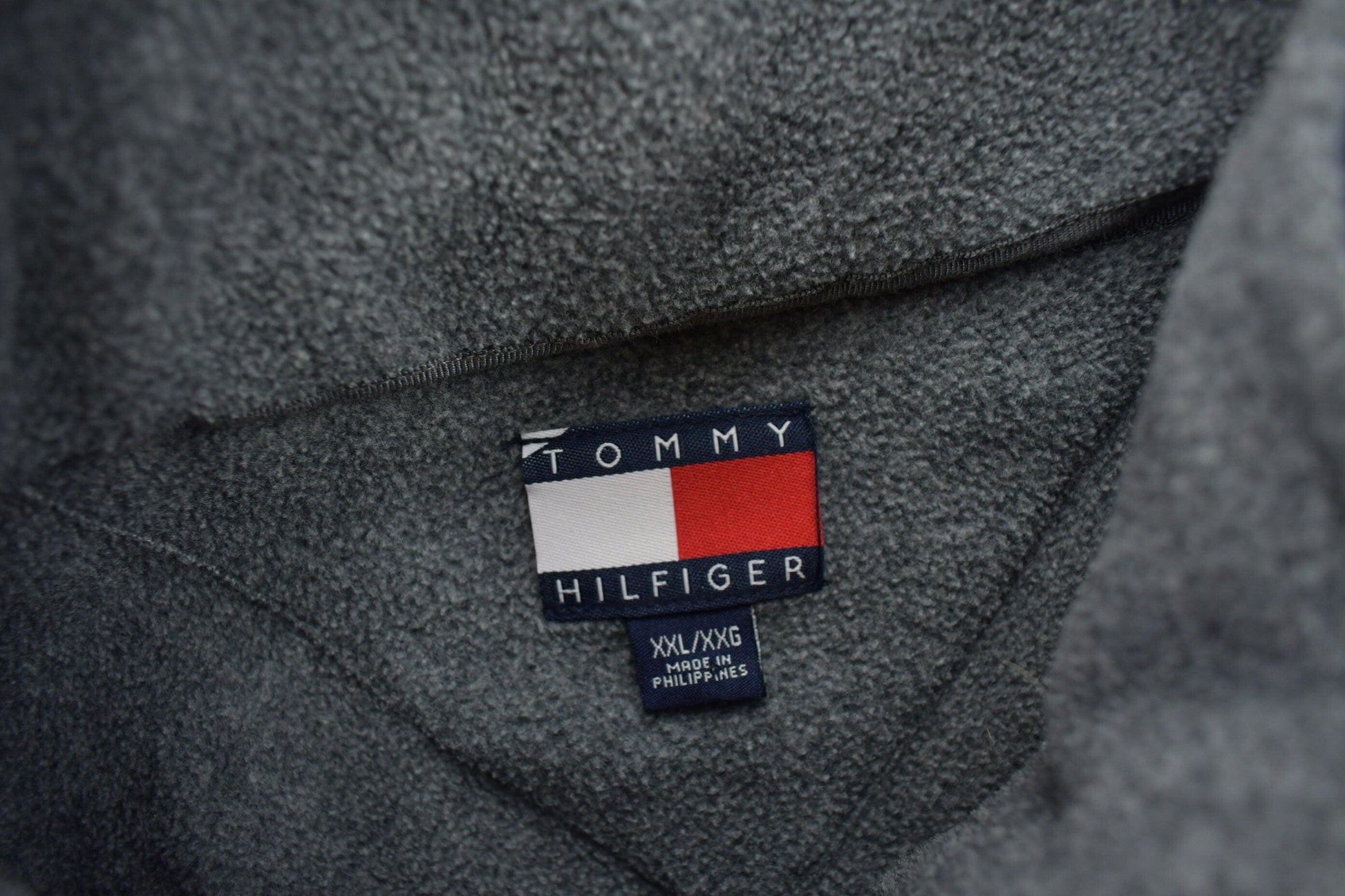 Vintage 1990s Tommy Hilfiger Flag Collar Quarter Zip Fleece Sweater Men's 2XL from propervintagecanada
