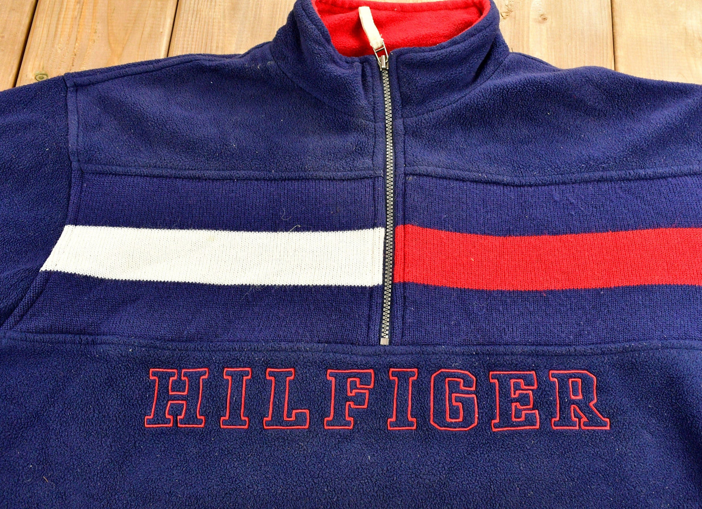 Vintage 1990s Tommy Hilfiger Flag Graphic Quarter Zip Fleece Sweater from propervintagecanada