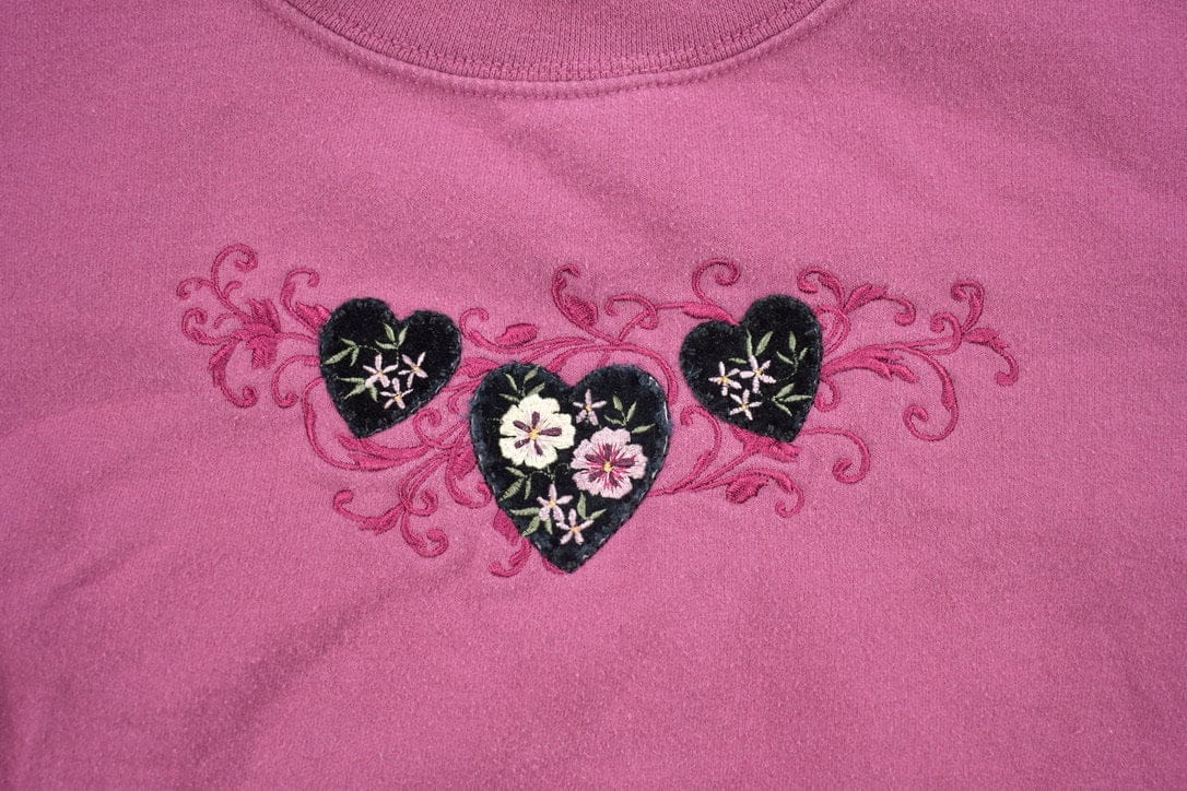 Vintage 1990s Top Stitch Heart Theme Crewneck Sweater Men's Large from propervintagecanada