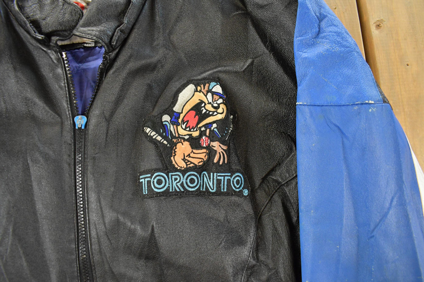 Vintage 1990s Toronto Blue Jays Looney Tunes Leather Jacket Men's Large from propervintagecanada