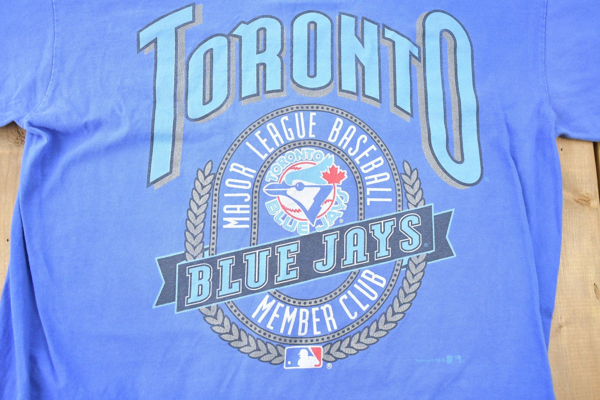 Vintage 1990s Toronto Blue Jays Member Club Nutmeg MLB Graphic T-shirt Men's Large from propervintagecanada