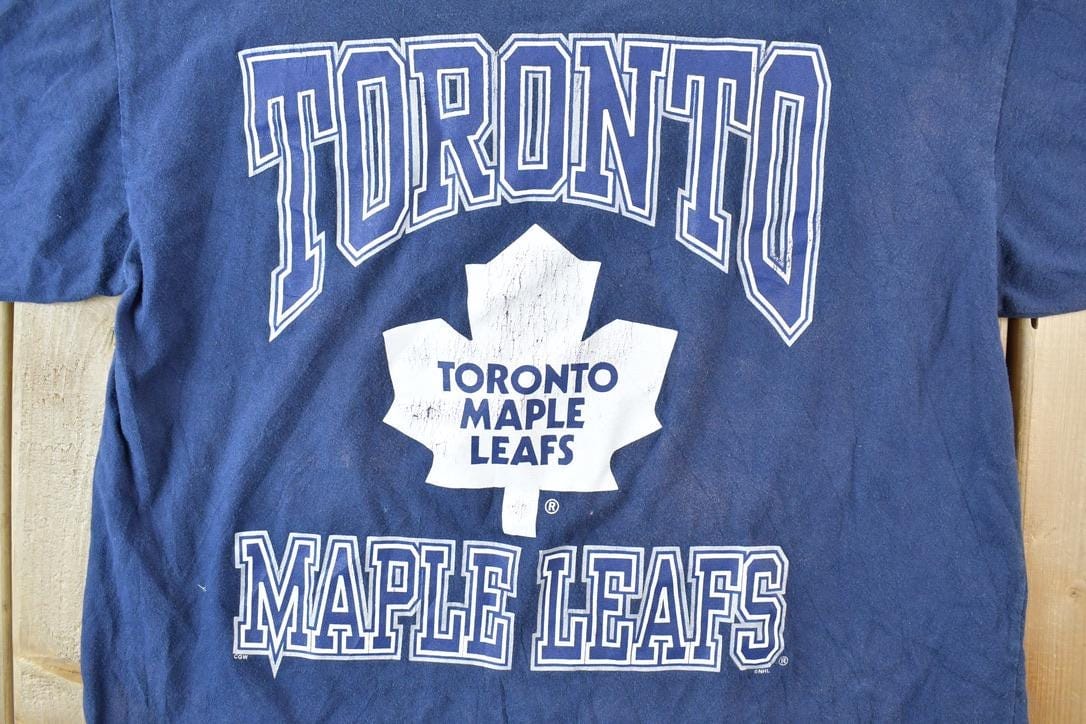 Vintage 1990s Toronto Maple Leafs NHL Graphic T-Shirt Men's Large from propervintagecanada