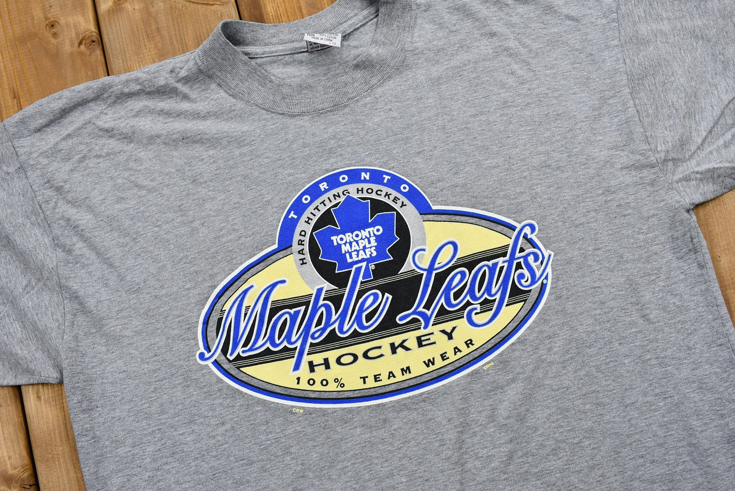 Vintage 1990s Toronto Maple Leafs T-Shirt / NHL / Hard Hitting Hockey / 90s Streetwear / Athleisure / Sportswear from propervintagecanada