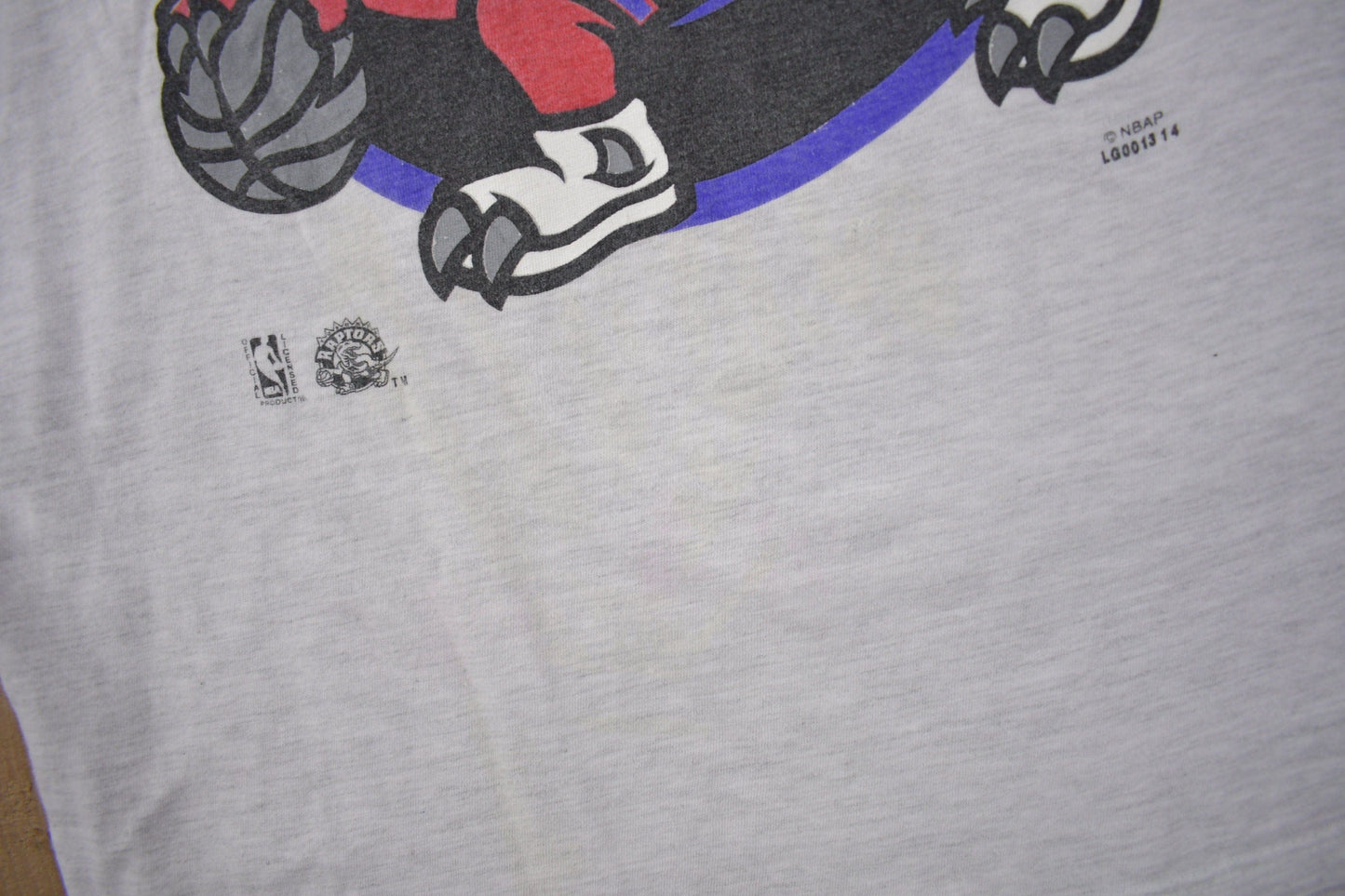 Vintage 1990s Toronto Raptors NBA Graphic T-Shirt Men's XL from propervintagecanada