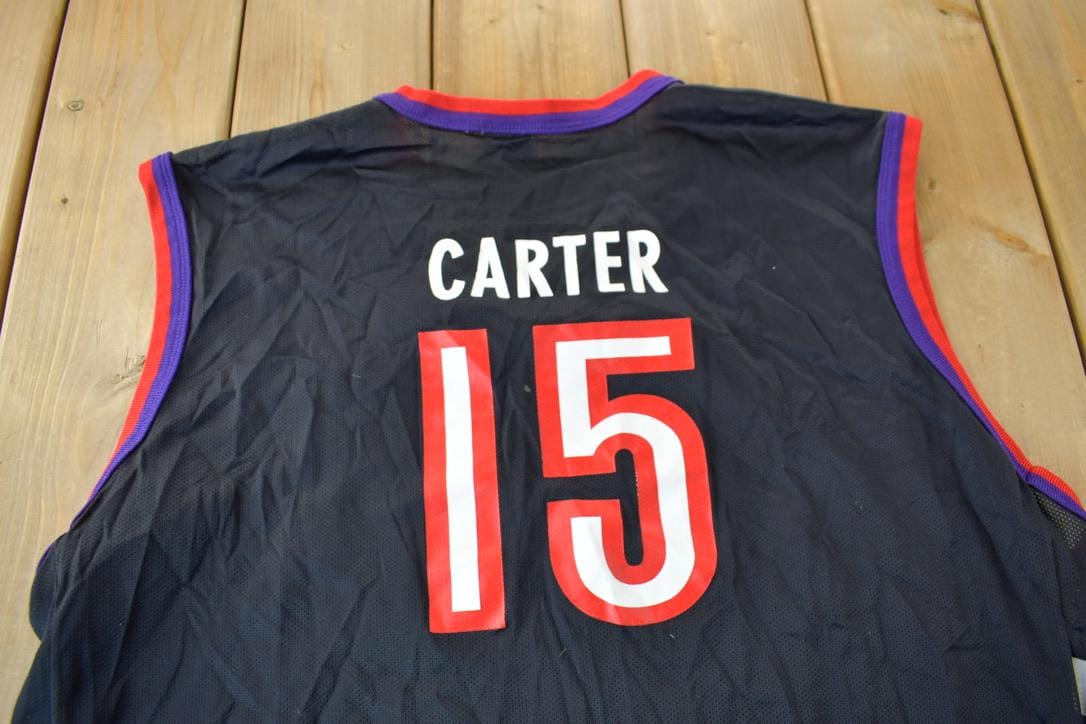 Vintage 1990s Toronto Raptors NBA Vince Carter Champion Jersey Men's XL from propervintagecanada