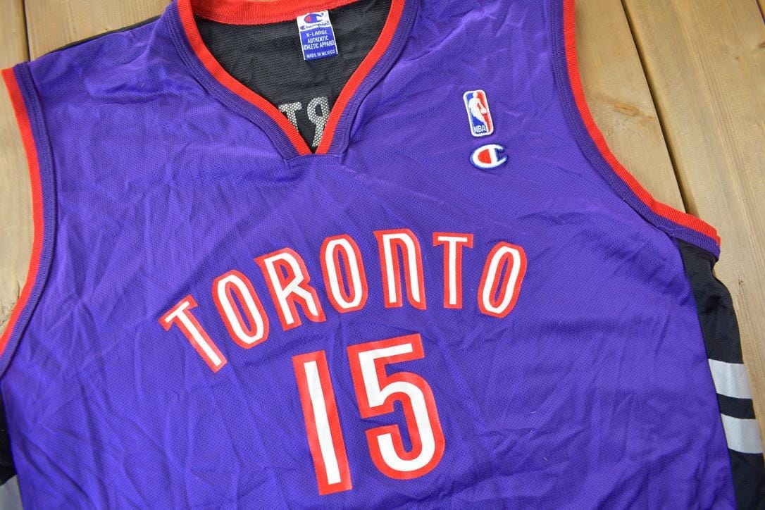 Vintage 1990s Toronto Raptors NBA Vince Carter Champion Jersey Men's XL from propervintagecanada