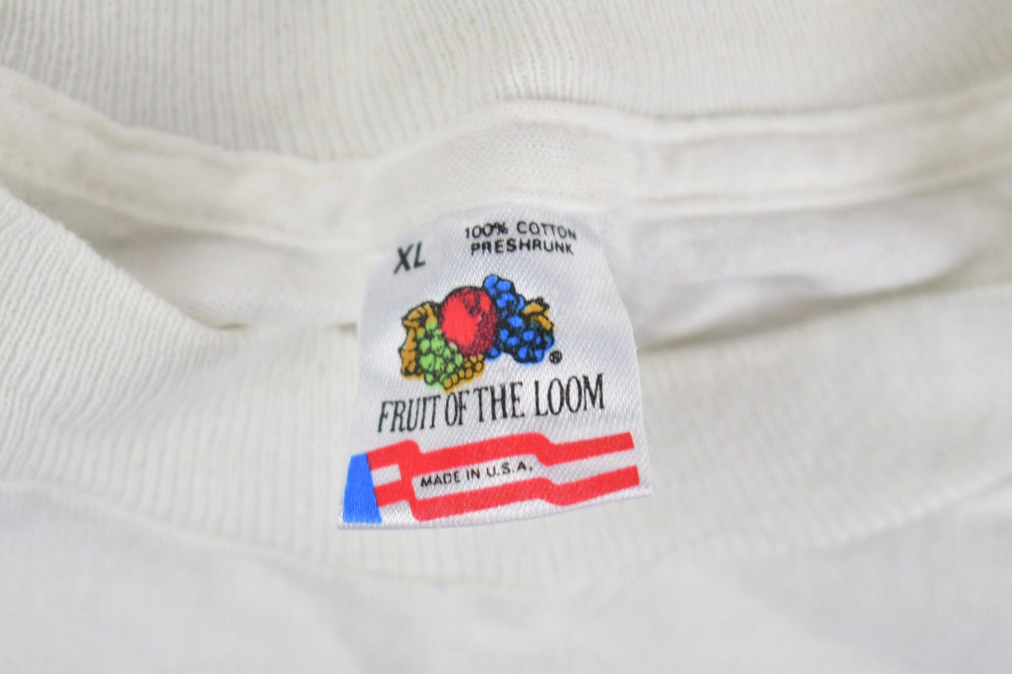 Vintage 1990s Trinity College NRAC Graphic Long Sleeve T-Shirt Men's XL from propervintagecanada