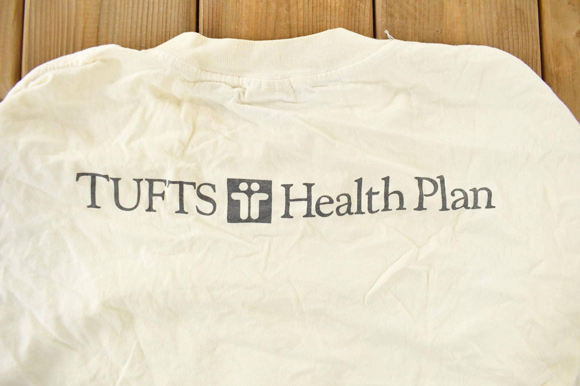 Vintage 1990s Tufts Health Plan Running Souvenir T-Shirt Men's Large from propervintagecanada