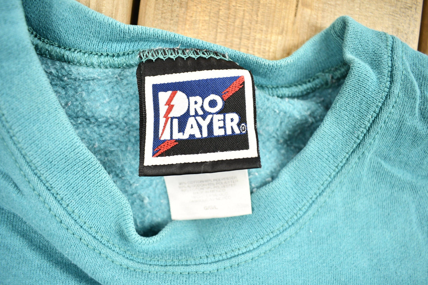 Vintage 1990s Turquoise Blank Pro Player Crewneck Sweatshirt Men's Small from propervintagecanada