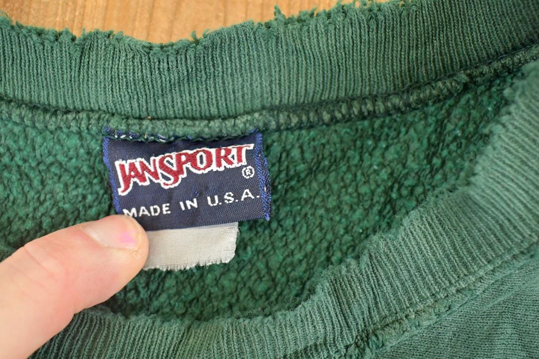 Vintage 1990s UMM Jansport Souvenir Crossgrain Crewneck Sweatshirt Men's L / 90's Tourist Vacation Graphic Sweater from propervintagecanada