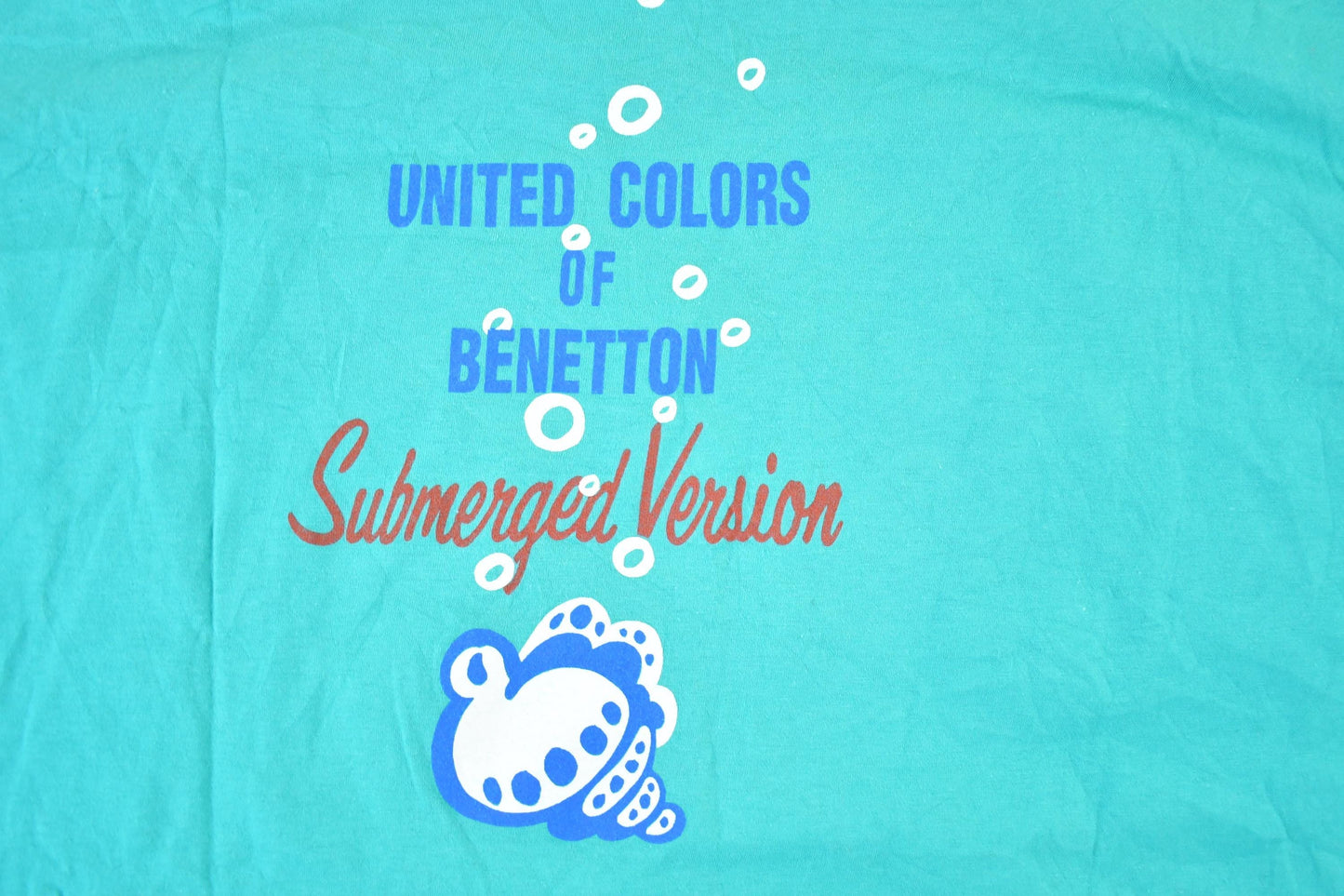 Vintage 1990s United Colours Of Benetton Souvenir Single Stitch Graphic Print T-Shirt Made In USA Men's XL from propervintagecanada