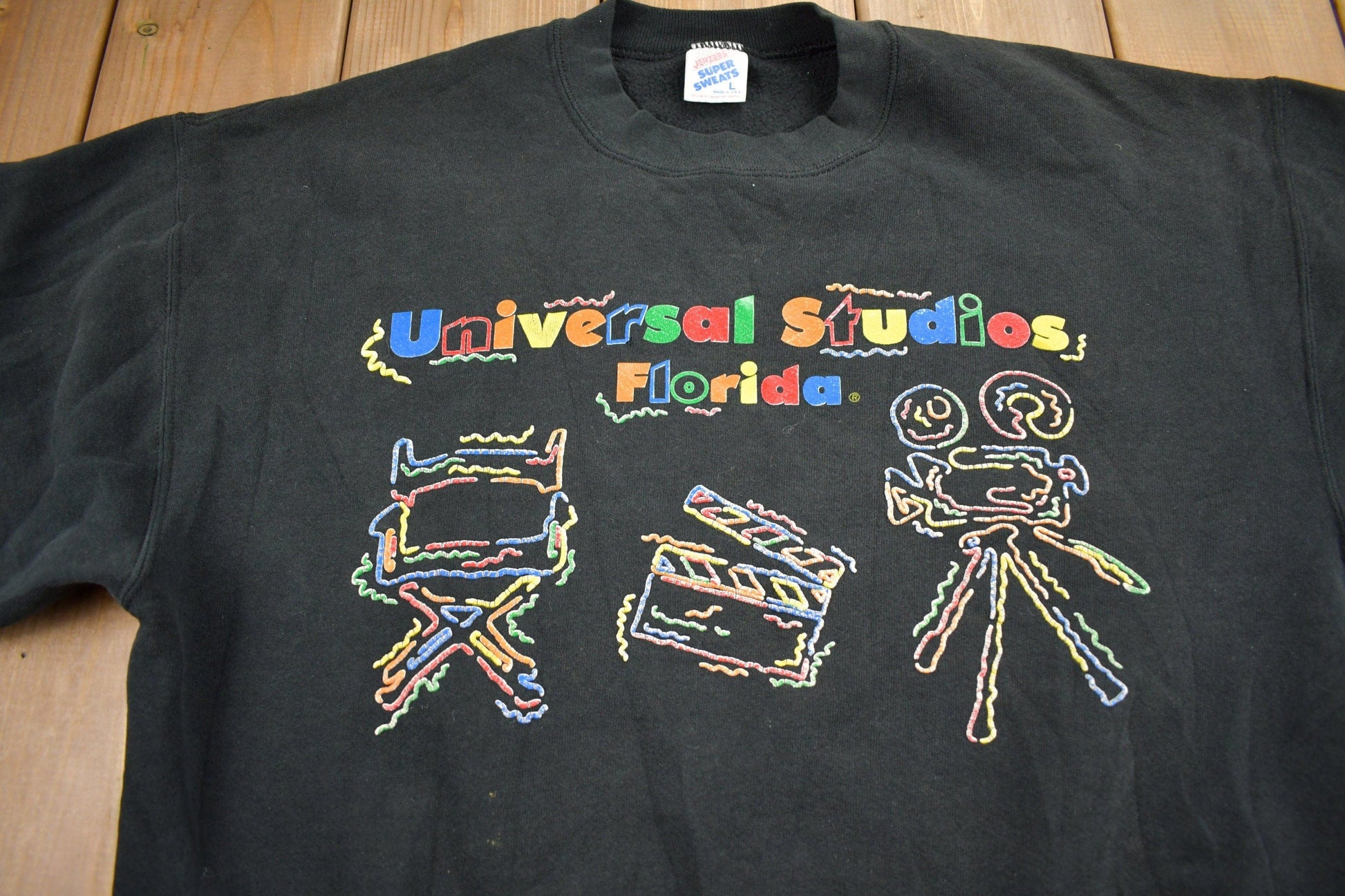 Vintage 1990s Universal Studios Florida Crewneck Sweatshirt Men's Large from propervintagecanada