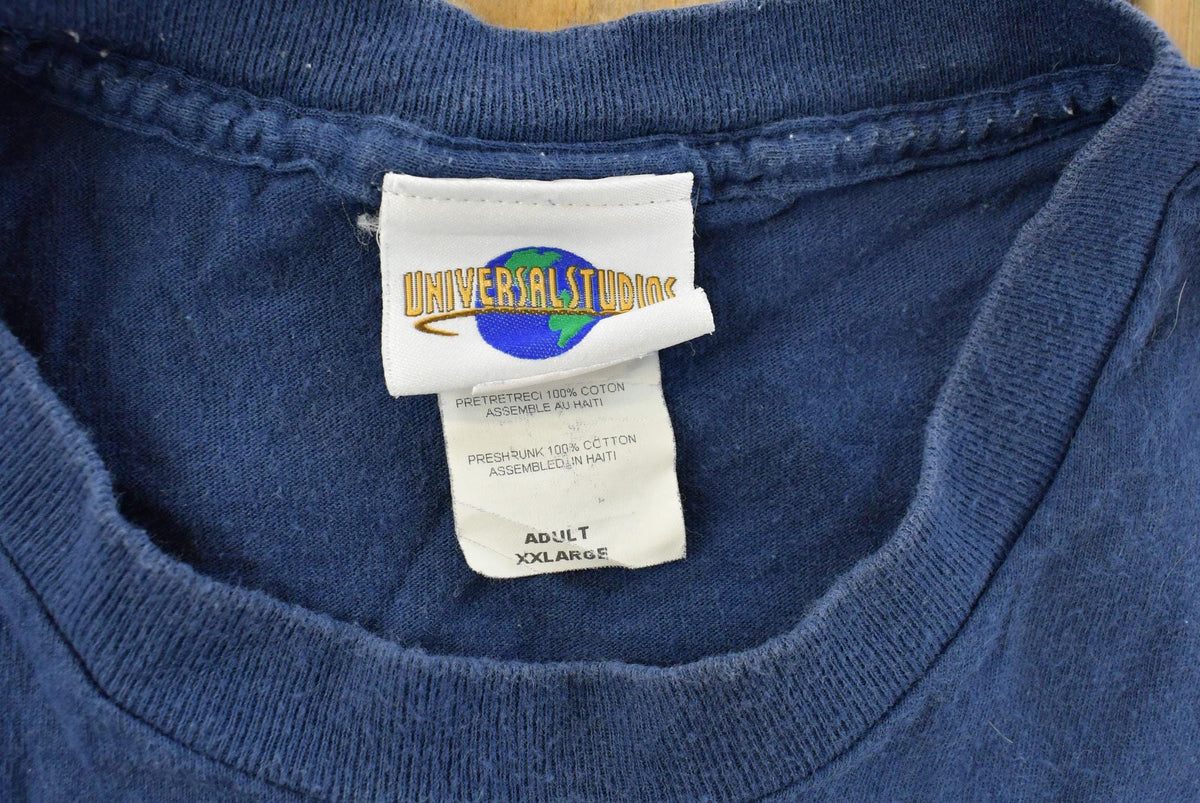 Vintage 1990s Universal Studios Woody Woodpecker Got Coffee Souvenir Cartoon T-Shirt Men's XL from propervintagecanada