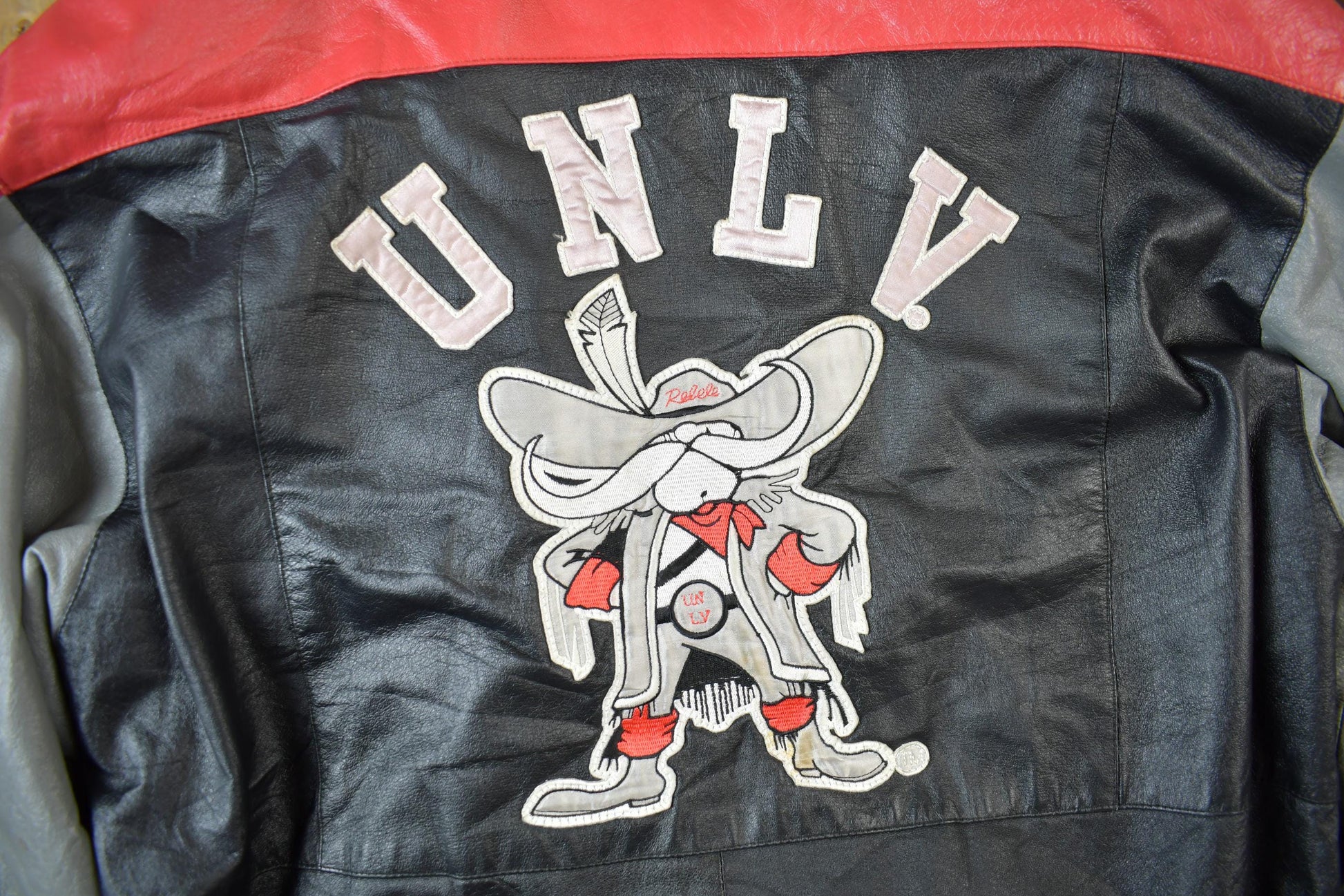 Vintage 1990s University of Las Vegas Rebels Collegiate NCAA Leather Jacket Men's Large from propervintagecanada