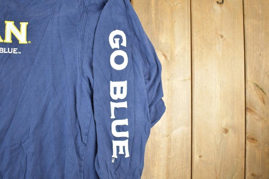 Vintage 1990s University Of Michigan Go Blue Collegiate Long Sleeve T-Shirt Men's XL from propervintagecanada